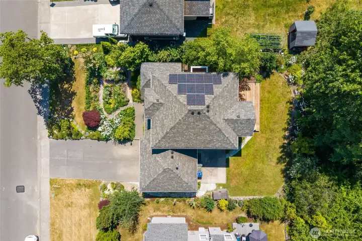 12 solar panel array tucked on the side roof covers nearly all electricity needs