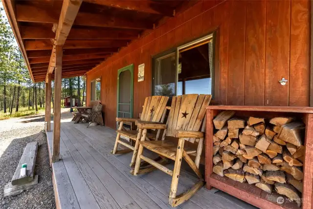 Covered front porch begs you to sit and stay awhile. Listen to the quiet.