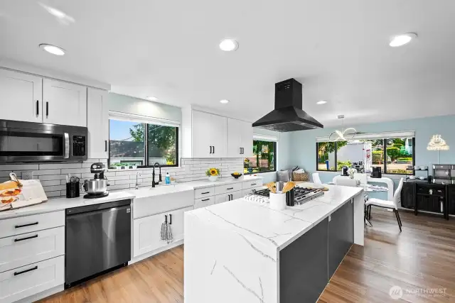 Modern chef's kitchen with new double oven and gas cooktop!