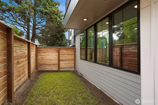Fenced Yard Space and Mechanical Room with Storage