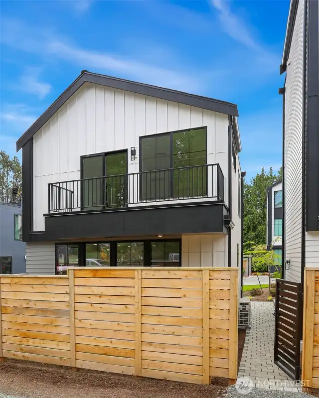 Gated Entry from N 117th St for guests, Balcony off Primary Bedroom