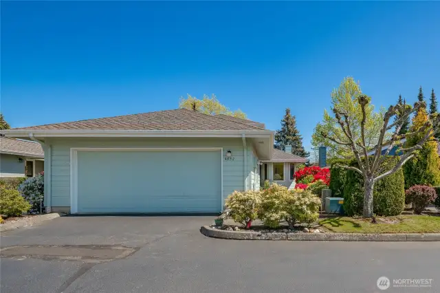 Large. attached garage, private walkway to entry