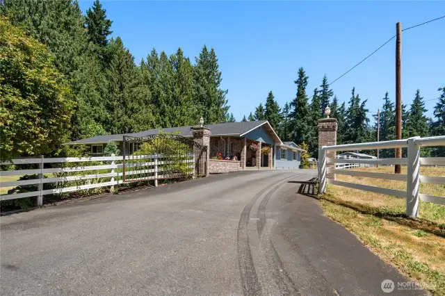 Welcome to your serene countryside estate with a fenced entry