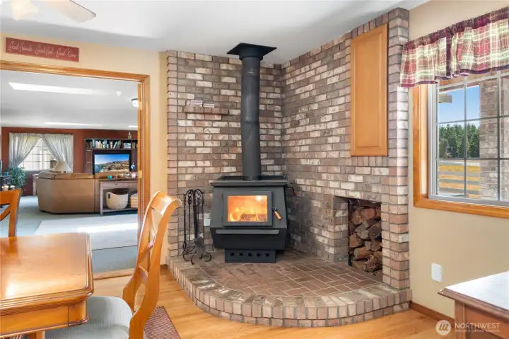 Warm and inviting area with a stone fireplace for chilly nights.