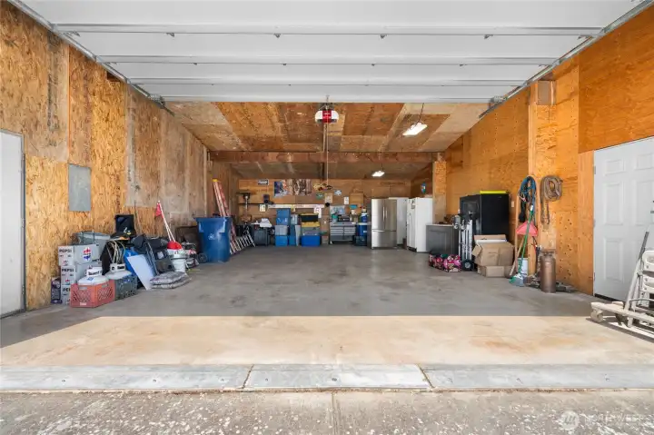 Secondary workspace perfect for vehicles, tools, or agricultural needs.