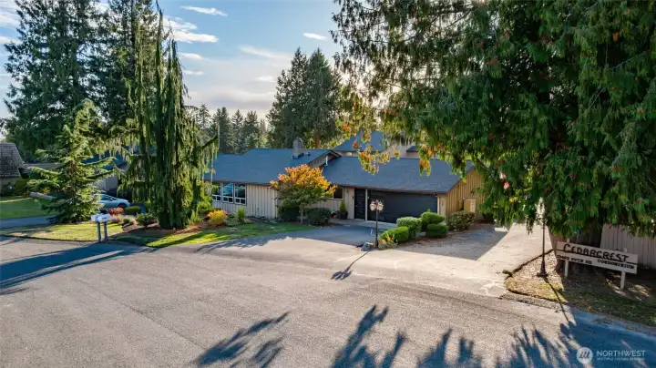 Private (not shared) driveway and two car attached garage.  Roof replaced 2022. New insulated garage door.