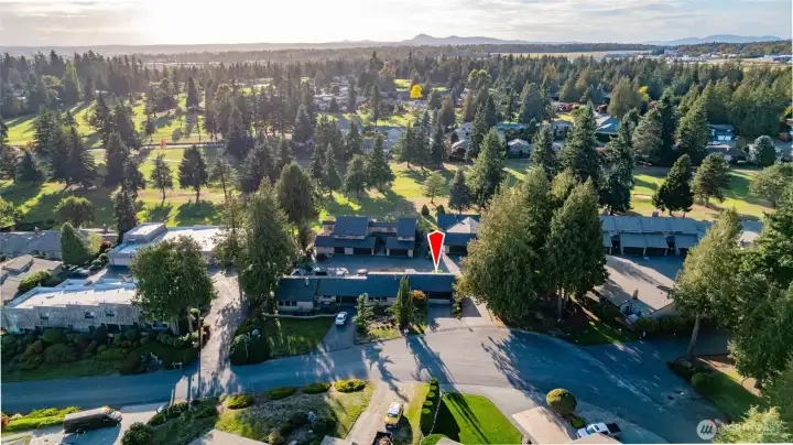 Red arrow is unit #1.  Skagit Golf & Country Club golf course is just beyond the condos.  Memberships available.