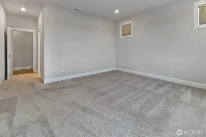 Another view of the primary bedroom.