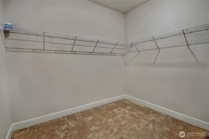 Primary walk-in closet.