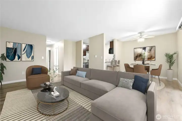 The open floor plan includes spacious living and dining rooms, adjacent to the pass-through kitchen!  Perfect for entertaining!