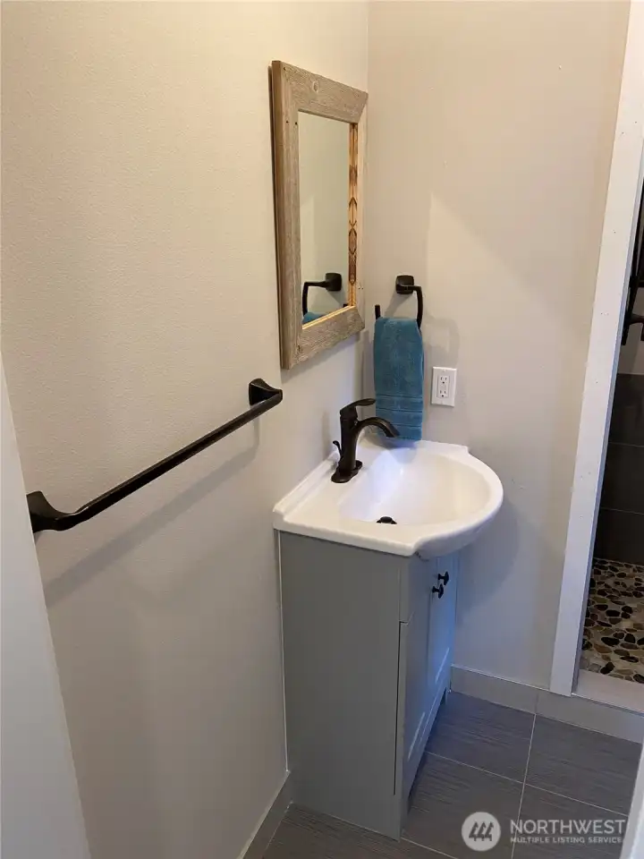 Compact vanity and sink.