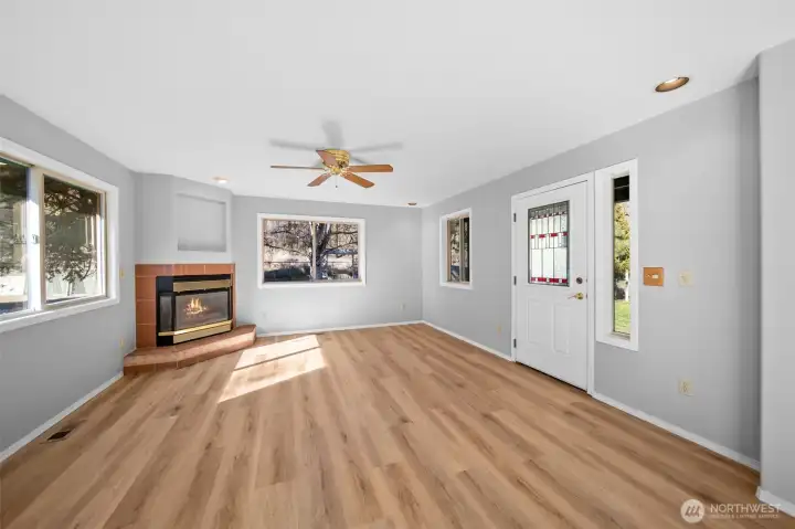 Entry into living room with gas firepalce.
