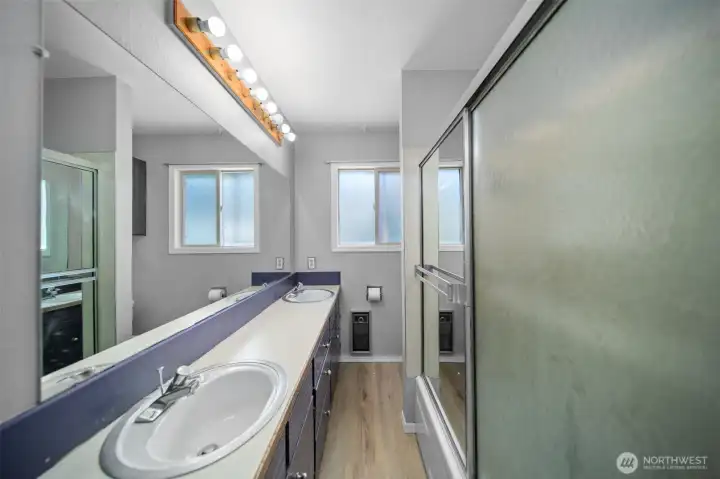 Bathroom with full tub & shower.