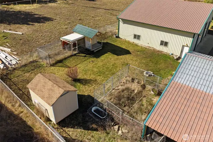 Overhead view between outbuildings, shed & chicken coop.