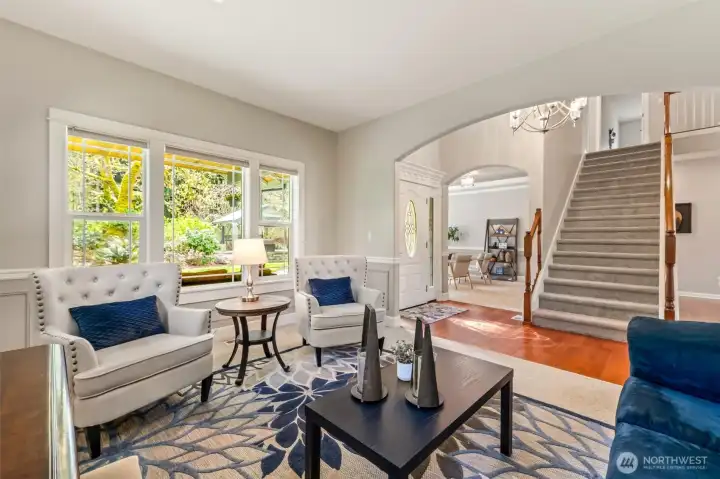 Living room with view to office beyond.