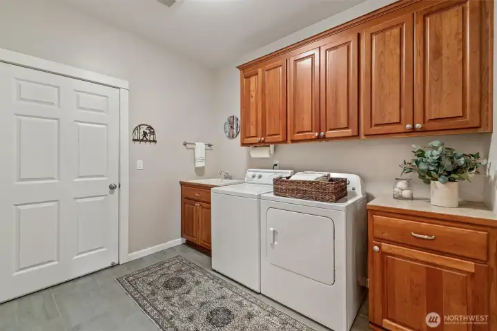 Main floor laundry with door to the garage.