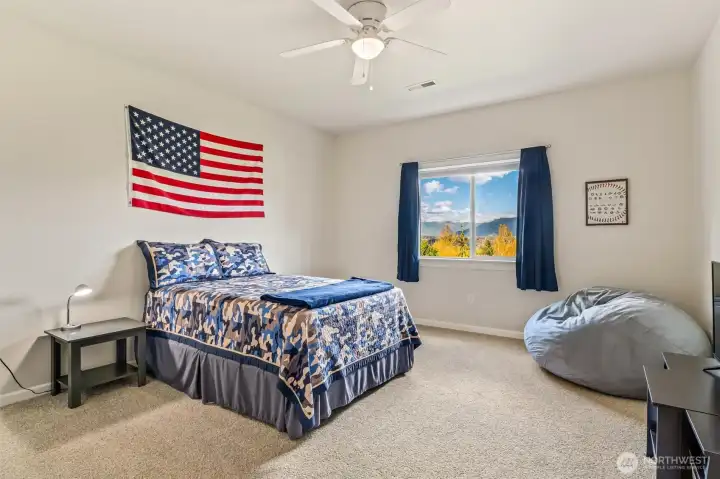 Upper ensuite bedroom with easterly view.