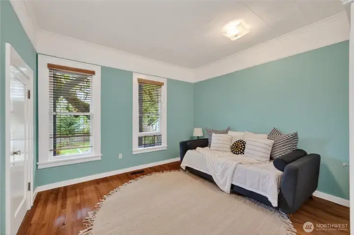 Bedroom on main floor with built-in cabinets