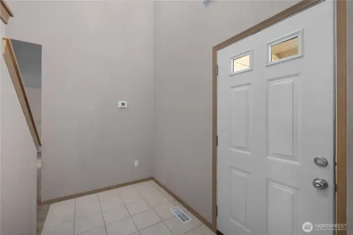 Light and bright entry with vaulted ceilings.