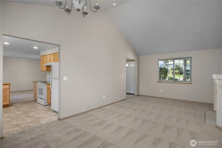 Living Room and dining area lead into kitchen.