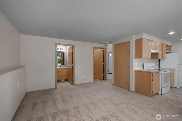 Rec room looking back to half bath.