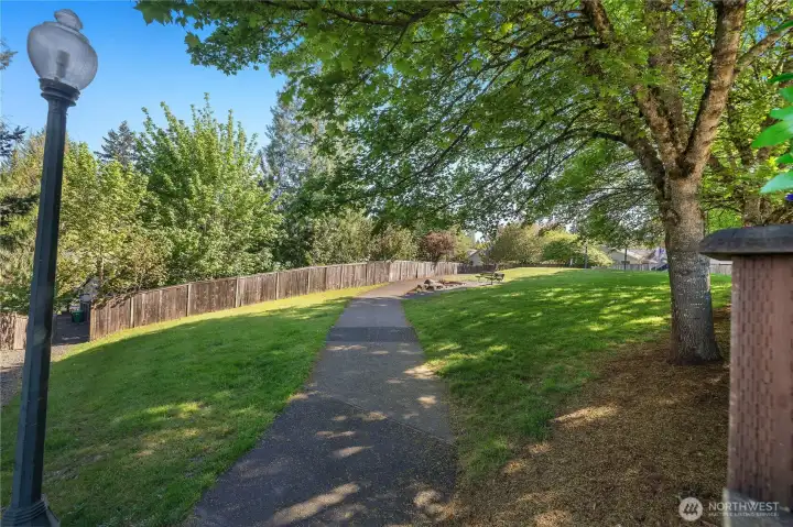 Trail leading to the community park located behind the home.