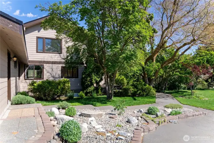 Walkway to garage (left) and kitchen door on right