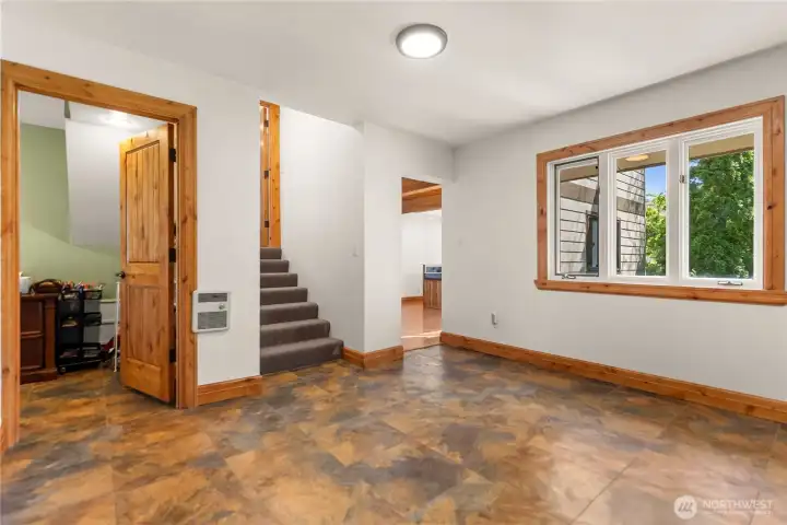 Entry area door to office and out to main kitchen/living area