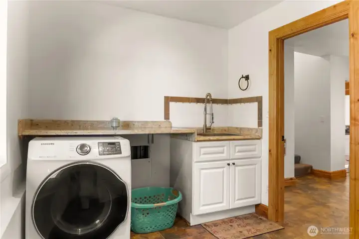 Main floor 1/2 bath & laundry view 2