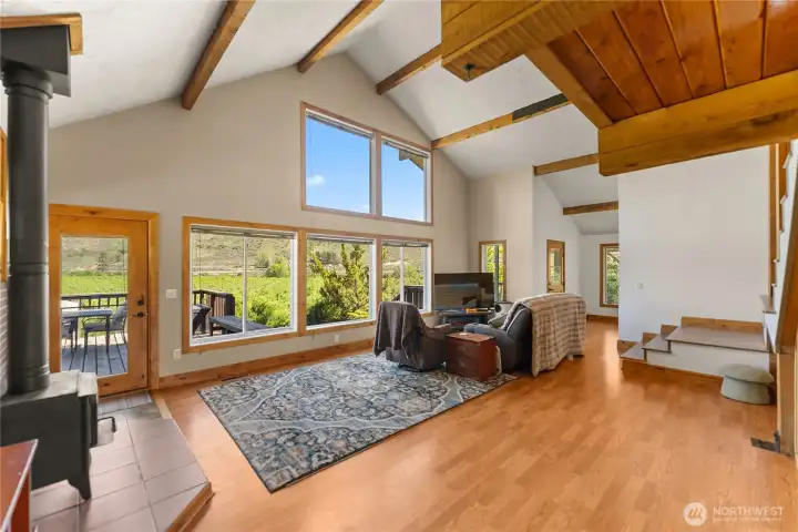 Large Great room with wood stove and vaulted ceilings