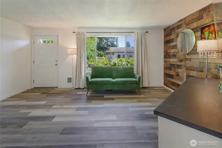 Good sized family room with big windows looking out to front of home