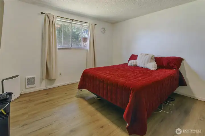 Large primary bedroom with new paint