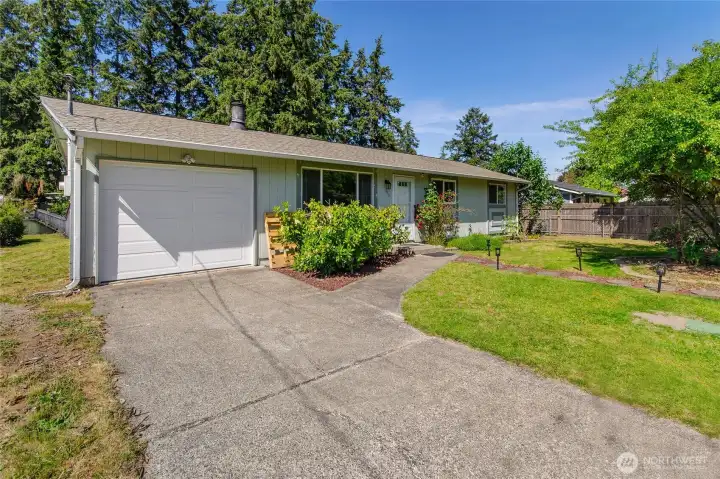 One car garage with back yard access on both sides of home