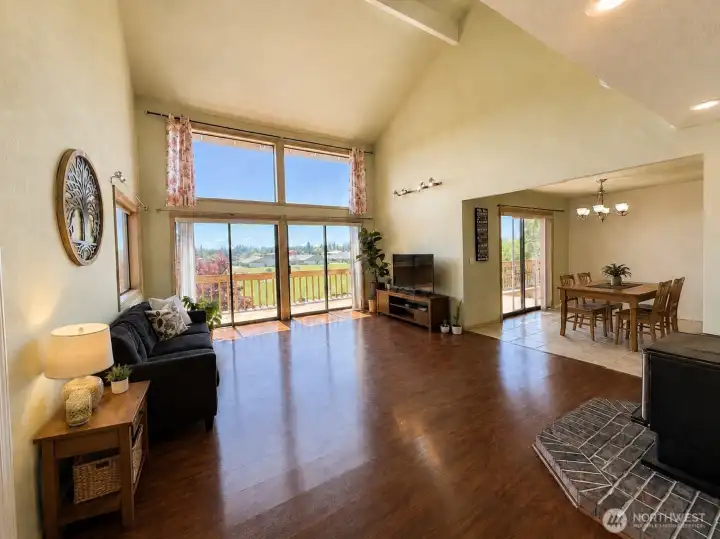 Your living room is flooded with natural light and opens to a territorial view from your wrap around deck. Your living room is flooded with natural light and opens to a territorial view from your wrap around deck.