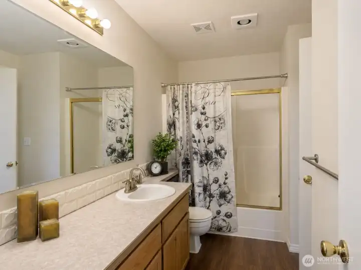 The full bath near front door, continental to the Primary bedroom off of living room. The full bath near front door, continental to the Primary bedroom off of living room.