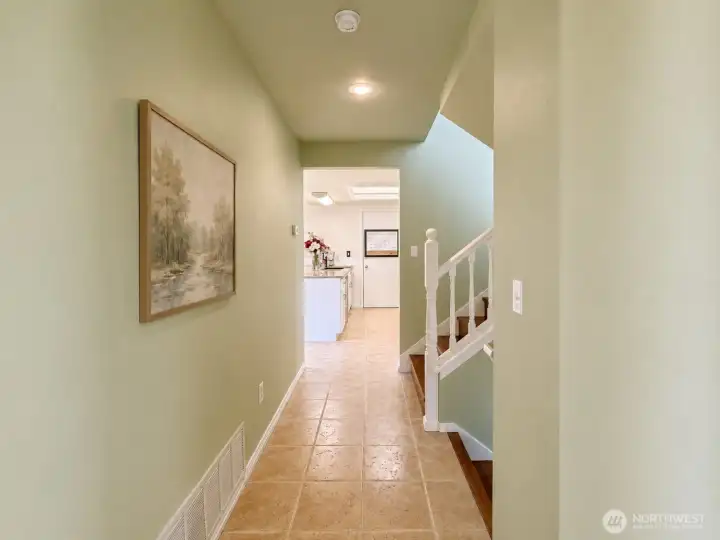 Hall way to upstairs and down. Hall way to upstairs and down.