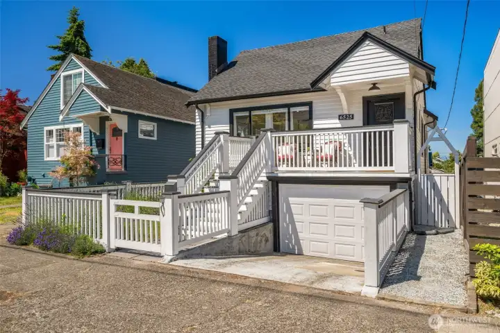 A 2-car (tandem) attached garage, a lovely front porch and back yard and deck- with views of the Olympic Mountains.