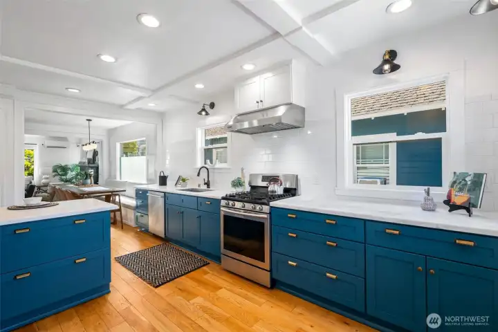 The WOW kitchen. The home was completely remodeled in 2018 and this kitchen is a dream! Tons of storage, cabinetry, quartz countertops, and gas cooking.