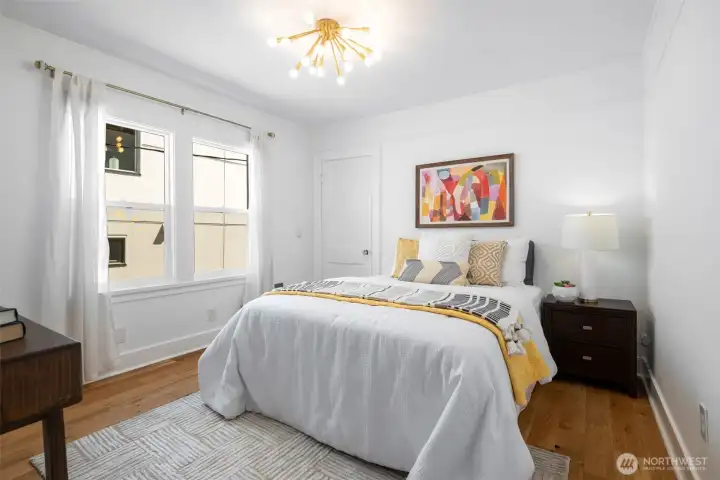 The main floor bedroom, great size and you could make your this room the primary bedroom on the main floor. Good sized closet and space for a queen and side tables.