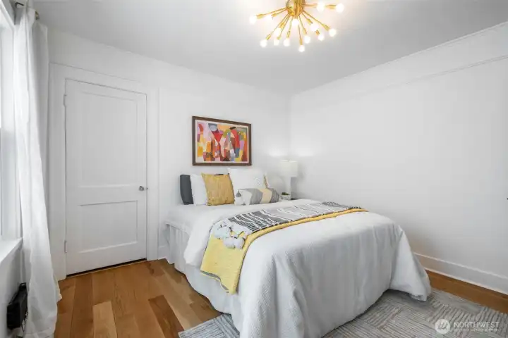 The wide plank flooring goes throughout this main floor and also fun Sputnik light fixtures!