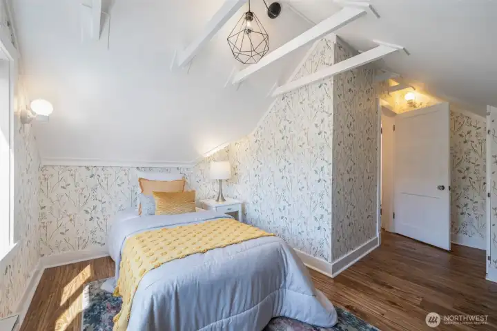 Good room for storage and the charm carries throughout with exposed trusses and vintage lighting.