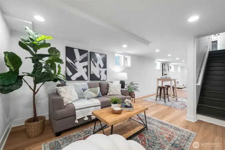 LVP floors and good ceiling height, the space is great for a den/media room and or guest space. There is a door just on the opposite wall that goes into the 2-car tandem garage.
