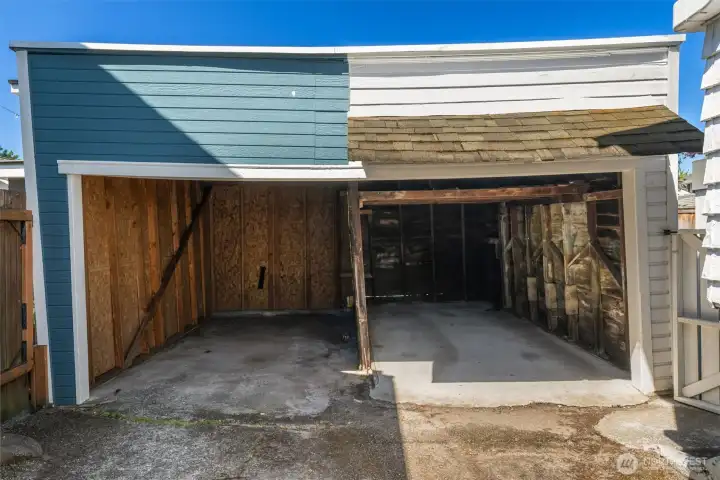 The carport at the end of the driveway is shared with the neighbor. We know it is funky but so great to have. Neighbors are super nice and they are willing to talk doing upgrades in the future.