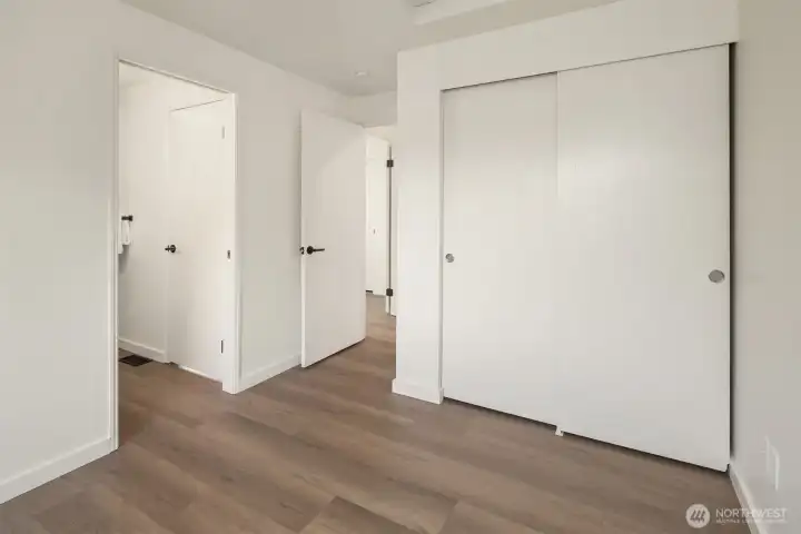 Another view of the secondary bedroom with a shared bath!
