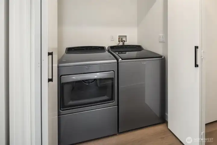 Upper level laundry area.