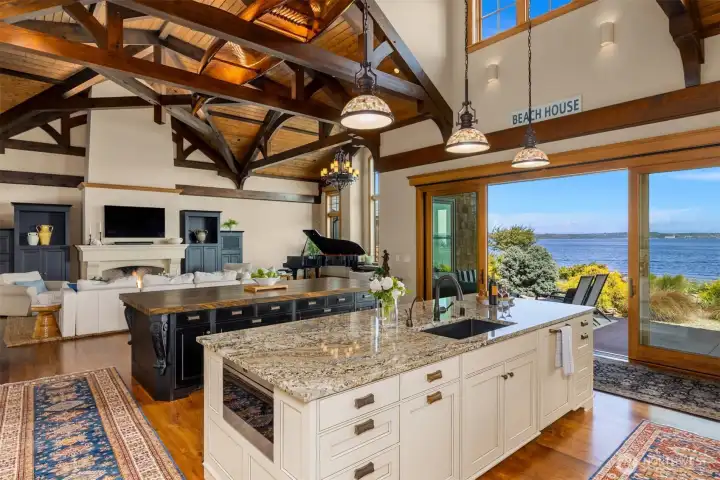 Slip outside and entertain on a magnificent patio that runs half the length of the house on the waterside. Multiple seating areas... Slip outside and entertain on a magnificent patio that runs half the length of the house on the waterside. Multiple seating areas...