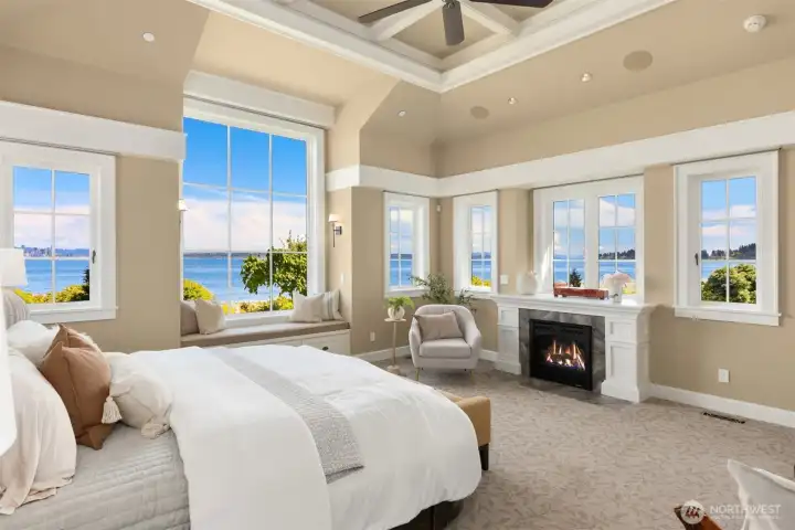 This primary suite is a private haven, offering sweeping water views, gentle morning light, and an atmosphere of complete tranquility. This primary suite is a private haven, offering sweeping water views, gentle morning light, and an atmosphere of complete tranquility.