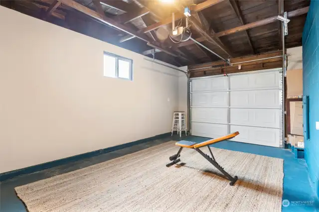 Your oversized garage has been insulated and sheetrocked, offering versatility to easily convert into a bonus room or home gym. Enjoy the potential to customize this space to suit your lifestyle needs, whether it's for recreation, fitness or additional living space.