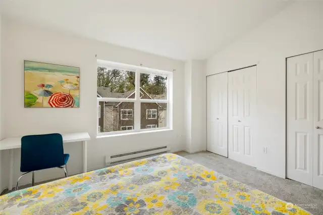 2nd bedroom with more double closets - light and bright.