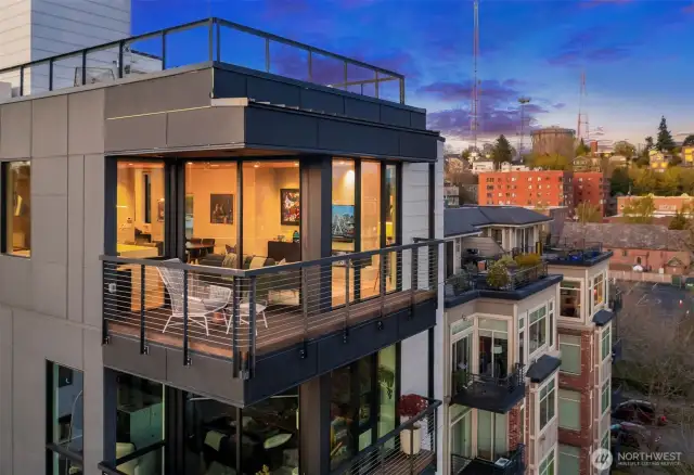 210 Comstock, just 8 total homes with this being the top floor penthouse.